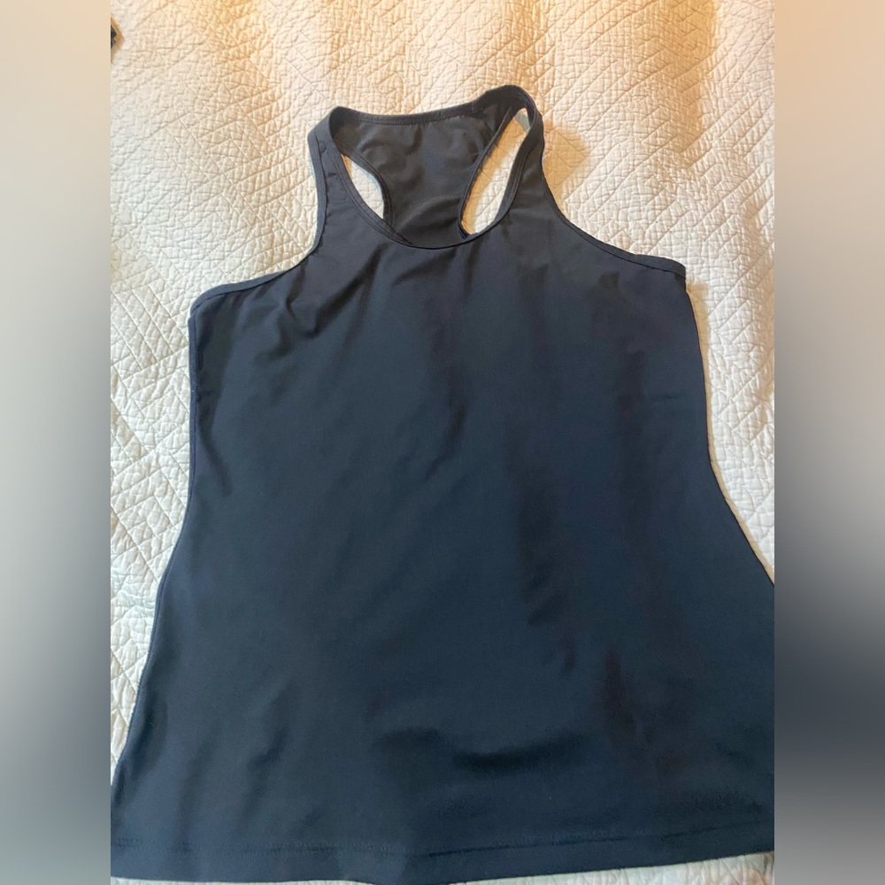 Women’s workout tank tops -multiples, never worn but no tag sorry!